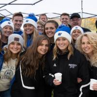 group photo at athletics tailgate